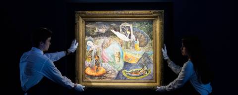 Sothebys art handlers hold Leonora Carrington's Les Distractions de Dagobert