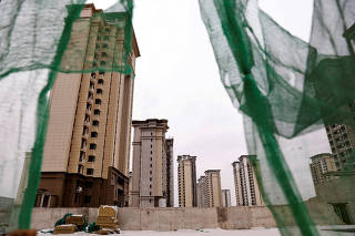FILE PHOTO: Unfinished residential development by China Evergrande Group, in the outskirts of Shijiazhuang