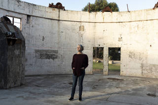 Penny Sackett, a former director of the Australian National UniversityÕs Mount Stromlo Observatory, in the remains of the observatory, which was destroyed by a wildfire in 2003, just outside Canberra, Australia, May 6, 2024. (David Maurice Smith/The New York Times)