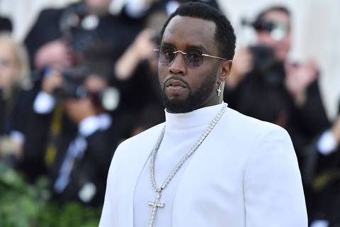 (FILES) Sean Combs 'P. Diddy' arrives for the 2018 Met Gala on May 7, 2018, at the Metropolitan Museum of Art in New York. Homes belonging to Sean 