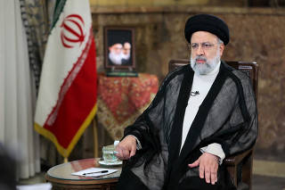 FILE PHOTO: Iranian President Ebrahim Raisi attends a TV interview in Tehran