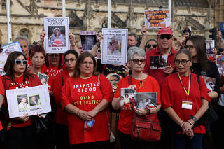 People impacted by the contaminated blood scandal gather in Westminster ahead of the release of the final report of the Infected Blood Inquiry