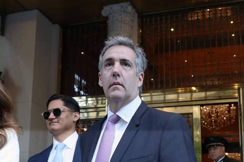 NEW YORK, NEW YORK - MAY 20: Michael Cohen, former personal lawyer to Donald Trump, leaves his apartment building on his way to Manhattan criminal court in New York on May 20, 2024. Cohen, while taking the witness stand in the Manhattan criminal trial, directly connected Donald Trump to the hush-money payment to adult-film actress Stormy Daniels to keep their alleged sexual encounter out of the news ahead of the 2016 election.   Spencer Platt/Getty Images/AFP (Photo by SPENCER PLATT / GETTY IMAGES NORTH AMERICA / Getty Images via AFP)