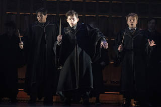 James Romney, center, as Albus Potter in the new version of the play ?Harry Potter and the Cursed Child,? at the Lyric Theater in Manhattan, Oct. 10, 2021. (Sara Krulwich/The New York Times)