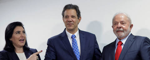 FILE PHOTO: Brazil's Planning and Budget Minister Simone Tebet, Brazil's President Luiz Inacio Lula da Silva and Brazil's Economy Minister Fernando Haddad attend a meeting to sign the government's economic package at the Planalto Palace in Brasilia January 12, 2023. REUTERS/Adriano Machado/File Photo ORG XMIT: FW1