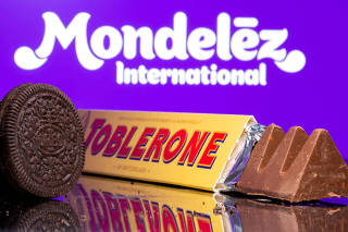 FILE PHOTO: Oreo biscuits and Toblerone milk chocolate displayed in front of a Mondelez International logo in this illustration picture