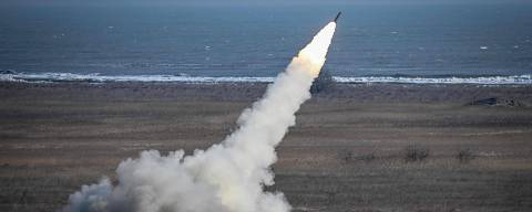 A Romanian army HIMARS (High Mobility Artillery Rocket System) mobile launcher fires a rocket during 
