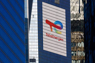 FILE PHOTO: Logo of French oil and gas company TotalEnergies in La Defense