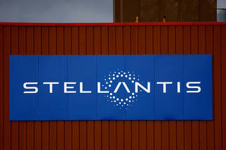 FILE PHOTO: The logo of Stellantis is seen outside a company building in Chartres-de-Bretagne near Rennes