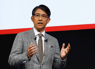 Toyota's CEO Koji Sato speaks at a press conference with Subaru's and Mazda's CEOs, in Tokyo