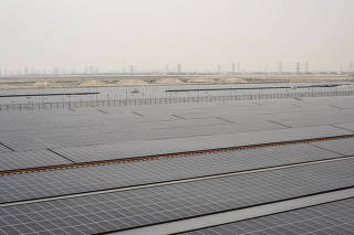 Arrays of solar panels that help power the Jazlah Water Desalination plant, reducing carbon dioxide emissions, in Jubail, Saudi Arabia, March 4, 2024. (Iman Al-Dabbagh/The New York Times)