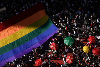 People celebrate iconic gay pride parade in Sao Paulo