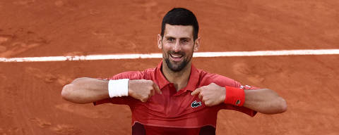 Tennis - French Open - Roland Garros, Paris, France - June 3, 2024 Serbia's Novak Djokovic celebrates after winning his fourth round match against Argentina's Francisco Cerundolo REUTERS/Yves Herman
