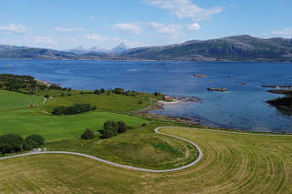 A photo provided by Hanne Bryn for the Norwegian University of Science and Technology Museum shows the Herlaugshaugen burial mound on Leka Island, off the coast of Norway, where the remains of an eighth-century ship were discovered. (Hanne Bryn/NTNU Unive