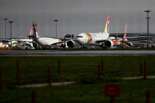FILE PHOTO: TAP Air Portugal planes are seen at Lisbon's airport in Lisbon. Portugal