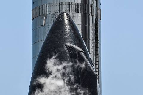 The SpaceX Starship is seen as it stands near the launchpad ahead of its fourth flight test from Starbase in Boca Chica, Texas on June 4, 2024. Starship, the world's most powerful rocket, is set for its next test flight on June 5, SpaceX announced on June 4.
The launch window from the company's Starbase in Boca Chica, Texas opens at 7:00 am local time (1200 GMT), pending regulatory approval.
It will be the fourth test for the sleek mega rocket, which is vital to NASA's plans for landing astronauts on the Moon later this decade, and to SpaceX CEO Elon Musk's hopes of eventually colonizing Mars. (Photo by CHANDAN KHANNA / AFP)