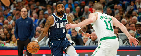 Jan 22, 2024; Dallas, Texas, USA; Dallas Mavericks guard Kyrie Irving (11) is defended by Boston Celtics guard Payton Pritchard (11) during the fourth quarter at American Airlines Center. Mandatory Credit: Andrew Dieb-USA TODAY Sports ORG XMIT: IMAGN-718858