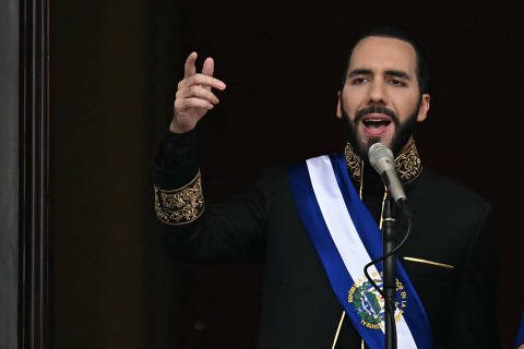 El Salvador's President Nayib Bukele addresses the attendees during his inauguration ceremony at the National Palace in downtown San Salvador on June 1, 2024. Bukele is sworn in for a second term, more popular -- and more powerful -- than ever. The 42-year-old, reelected in February with 85 percent of the vote, is set to govern for another five years with near-total control of parliament and other state institutions. (Photo by Marvin RECINOS / AFP)