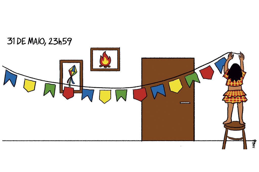 Charge de Marília Marz com o título "31 de maio, 23h59" mostra uma moça decorando sua casa com adereços de festa junina. Ela está estendendo um fio de bandeirinhas e, ao fundo, há na parede quadros de fogueira e balão