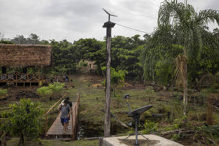 A Starlink antenna in Manakeiaway, a village of the Marubo indigenous people, who have had high-speed internet access since September, in Brazil?s Acre state on April 7, 2024. (Victor Moriyama/The New York Times)