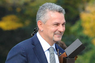FILE PHOTO: Former Italy striker Baggio smiles after receiving Peace Summit Award at the 11th World Summit of Nobel Peace Laureates in Hiroshima