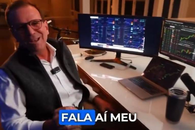 Vestido com colete e em frente a telas de computadores, o prefeito Eduardo Paes (PSD) anuncia criação de Bolsa de Valores no Rio e tira onda com os "amigos da Faria Lima"