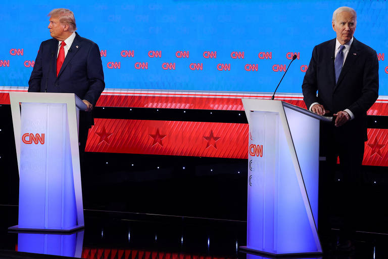 Durante o debate promovido pela CNN, o ex-presidente dos EUA Donald Trump e o atual, Joe Biden, evitam contato visual