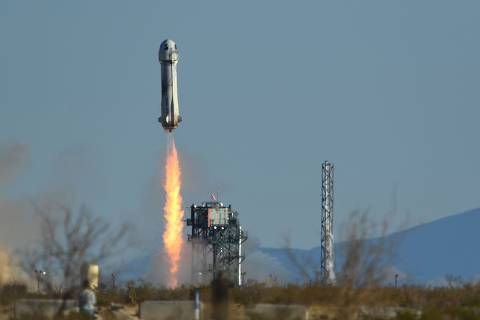(FILES) A Blue Origin New Shepard rocket launches from Launch Site One in West Texas north of Van Horn on March 31, 2022. Blue Origin said on Tuesday it was aiming to launch its New Shepard suborbital rocket next week. 