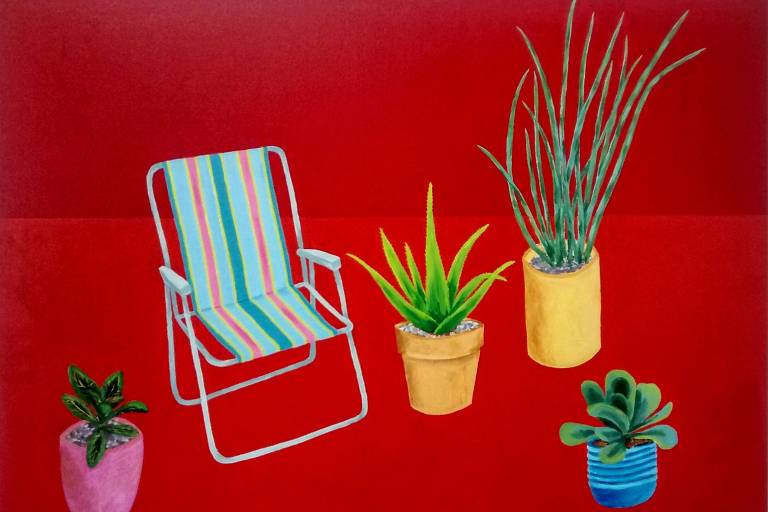 Quadro de fundo vermelho com uma cadeira de praia e árvores