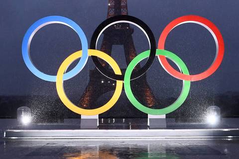 (FILES) A picture shows the Olympics Rings on the Trocadero  Esplanade near the Eiffel Tower in Paris, on September 13, 2017, after the  International Olympic Committee named Paris host city of the 2024 Summer Olympic Games. The Olympic rings will be installed on the Eiffel Tower for the Paris 2024 Olympic Games, it was learned from the site's operator said on April 8, 2024. (Photo by CHRISTOPHE SIMON / AFP)