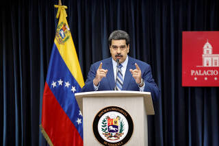 FILE PHOTO: Venezuela's President Nicolas Maduro speaks during a news conference at Miraflores Palace in Caracas