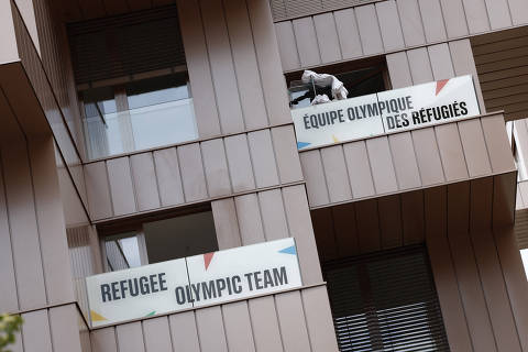 Paris 2024 Olympics - Preview - Paris, France - July 23, 2024 Refugee Olympic team signage is pictured on their accommodation block in the Olympic village, ahead of the Paris 2024 Olympics REUTERS/Benoit Tessier
