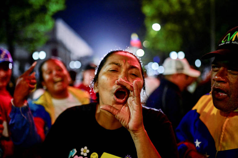 Apoiadores celebram anúncio de vitória de Maduro em Caracas; veja fotos de hoje