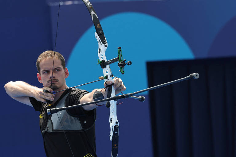 Marcus D'Almeida durante disputa contra o japonês Fumiya Saito
