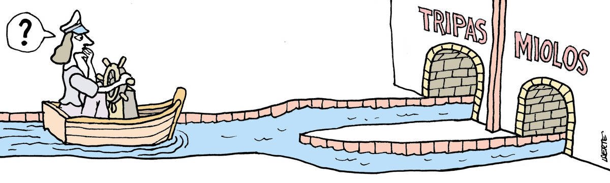 Tira de Laerte, em uma única imagem: Uma mulher pilota um pequeno barco, que lembra os de um parque de diversões, empunhando um timão instalado no meio dele. Ela usa um quepe como capitã de navio e navega em um canal estreito, com acabamento de ladrilhos. Ela tem a mão sobre a boca e emite um balão com uma grande interrogação. À sua frente, o canal em que navega se divide em dois canais, que entram em dois túneis diferentes - sobre um deles está escrito “TRIPAS” e sobre o outro está escrito “MIOLOS”. Ela vai ter que decidir que rumo tomar.