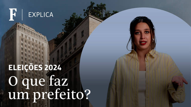 Victória é uma menina branca de cabelos acastanhadas, veste camisa listrada aberta e uma blusa branca.