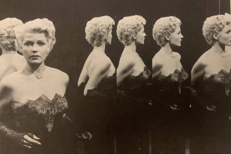  Rita Hayworth, numa cena clássica de A Dama de Shangai, com vestido preto tomara que caia