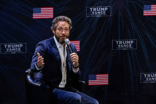 Robert F. Kennedy Jr. and Tulsi Gabbard campaign for Republican presidential nominee and former U.S. President Donald Trump during a moderated discussion with actor Zachary Levi in Dearborn