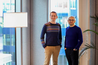 Demis Hassabis and John M. Jumper, two of the three laureates who have been awarded the Nobel Prize in Chemistry for 2024, look on, at the offices of Google DeepMind UK in London