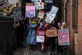 Alliance for Choice activists march in Belfast, Northern Ireland, Nov. 21, 2019. (Mary Turner/The New York Times)