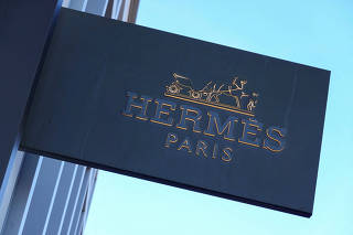 FILE PHOTO: A Hermes store sign is seenat a shopping mall in California