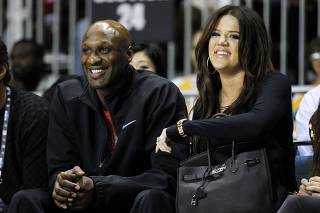 File photo Los Angeles Lakers' Lamar Odom and his wife television personality Khloe Kardashian in Los Angeles