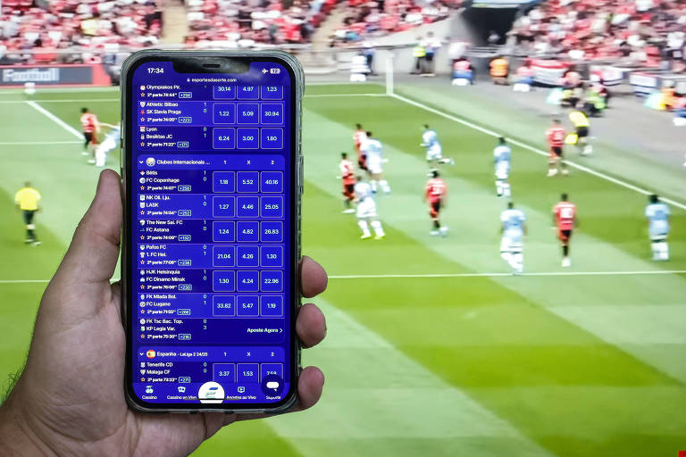 Celular com plataforma de casa de apostas esportivas