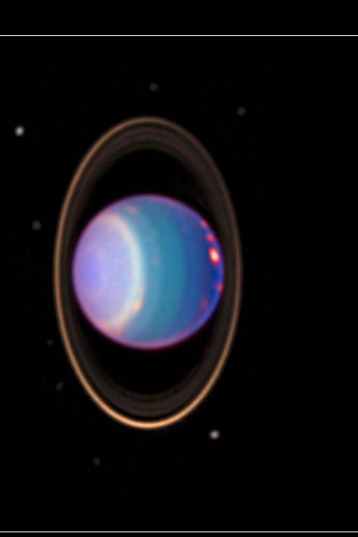 A imagem mostra o planeta Uranus , com sua coloração azul e anéis visíveis ao redor. O fundo é negro, destacando o planeta e seus anéis, além de algumas pequenas estrelas ao redor.