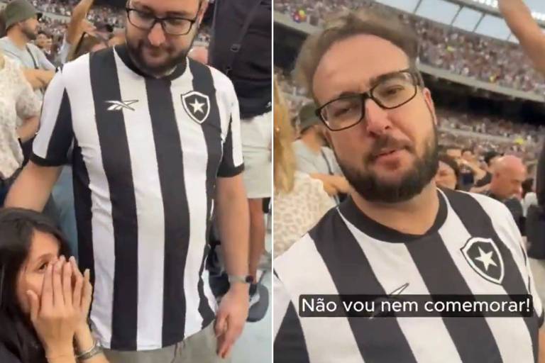 A imagem mostra dois torcedores em um estádio. À esquerda, uma mulher com as mãos cobrindo o rosto, visivelmente emocionada ou preocupada. À direita, um homem com óculos e barba, vestindo uma camisa listrada em preto e branco, típica de torcedores do Botafogo, que está falando para a câmera. O texto na parte inferior da imagem diz: 'Não vou nem comemorar!' Ao fundo, há uma multidão de torcedores.