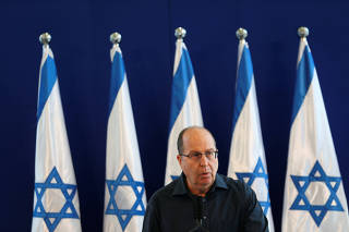 Israel's Defence Minister Yaalon gives a statement to the press at the Kirya Army base in Tel Aviv, Israel