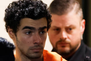Luigi Mangione attends an extradition hearing at Blair County Court House in Hollidaysburg, Pennsylvania