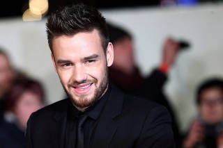 FILE PHOTO: Singer Liam Payne poses for photographers at the world premiere of the film 