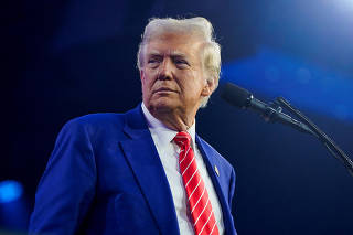 FILE PHOTO: U.S. President-elect Trump attends a Turning Point USA event in Phoenix, Arizona
