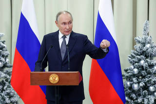 Russian President Putin attends a press conference in Leningrad region
